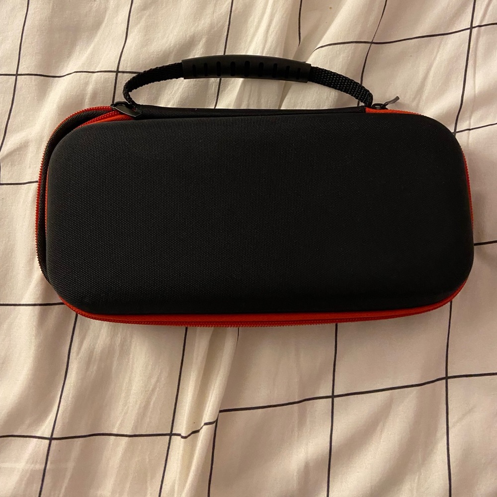 Nintendo switch carrying case in black and red